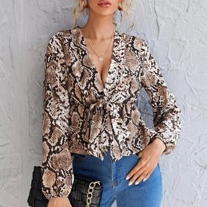 Snakeskin peplum satin top